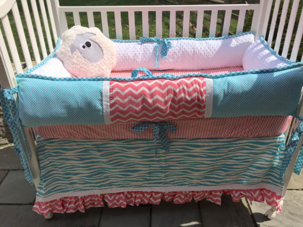 Coral and Blue Nursery Bedding